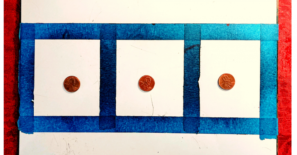 sound board on white board with pennies to teach children to sound out words